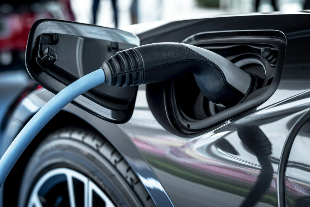 Tesla electric car charging at home using rooftop solar panel system