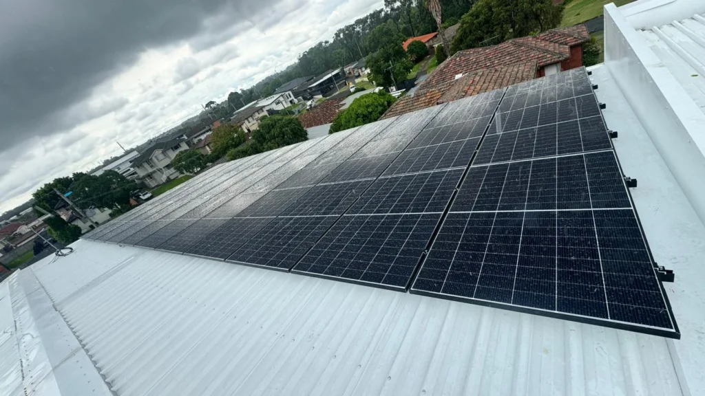Homeowner consulting solar electrician Sydney about underperforming solar system